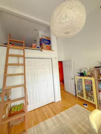 a view of a livingroom with furniture and garage
