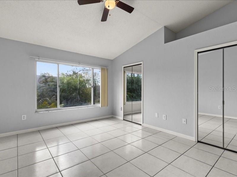 29924 Playa Del Rey Lane Wesley Chapel, FL 33543 - Photo 18 of 31 a view of an empty room with a window