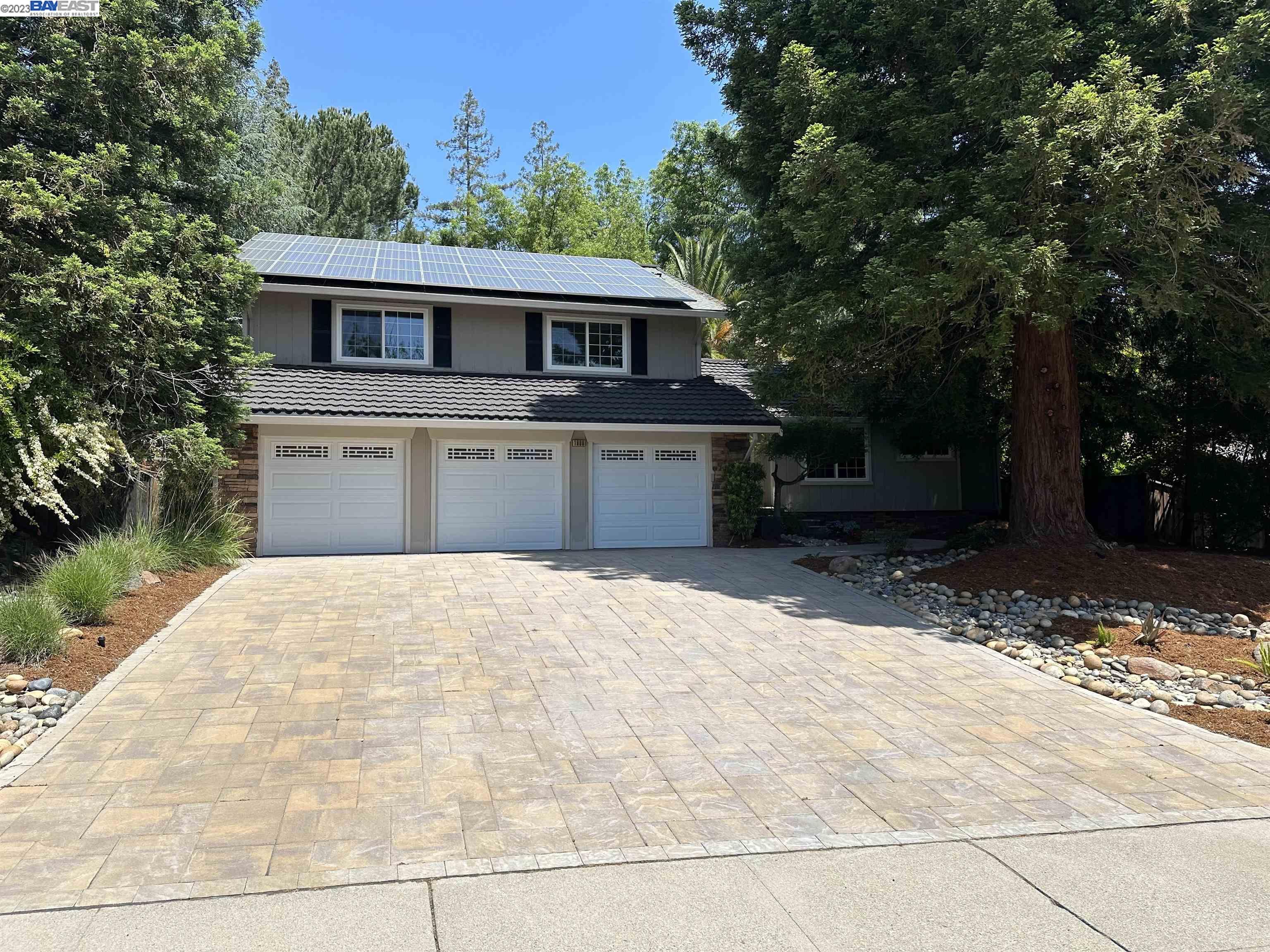 a front view of house with a yard