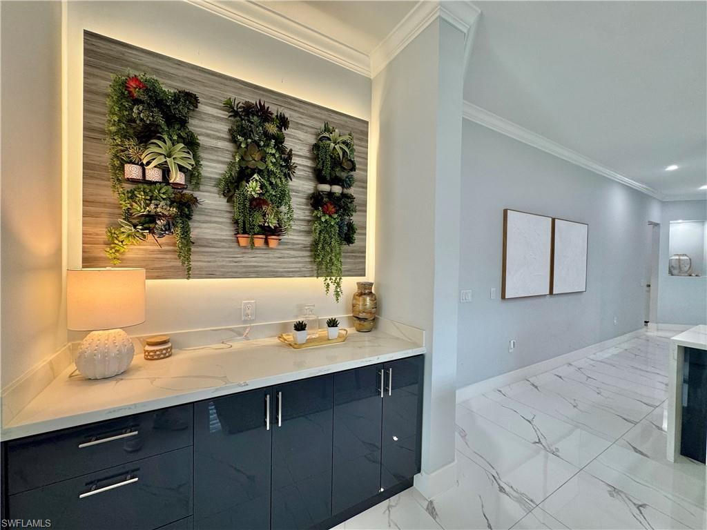 656 108th Avenue North Naples, FL 34108 - Photo 13 of 48 View of bar in the dining area.