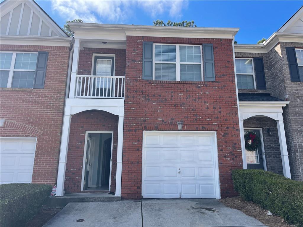 1538 Viero Drive Duluth, GA 30096 - Photo 1 of 8 a front view of a house with a yard