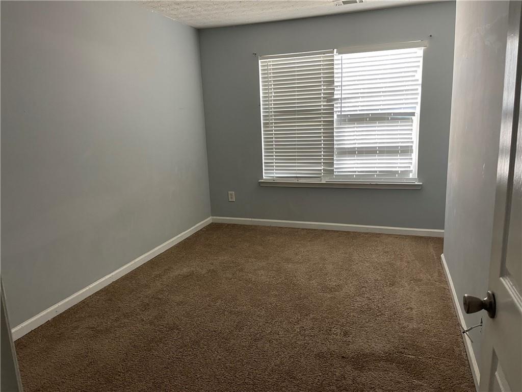 1538 Viero Drive Duluth, GA 30096 - Photo 7 of 8 a view of a room with a window