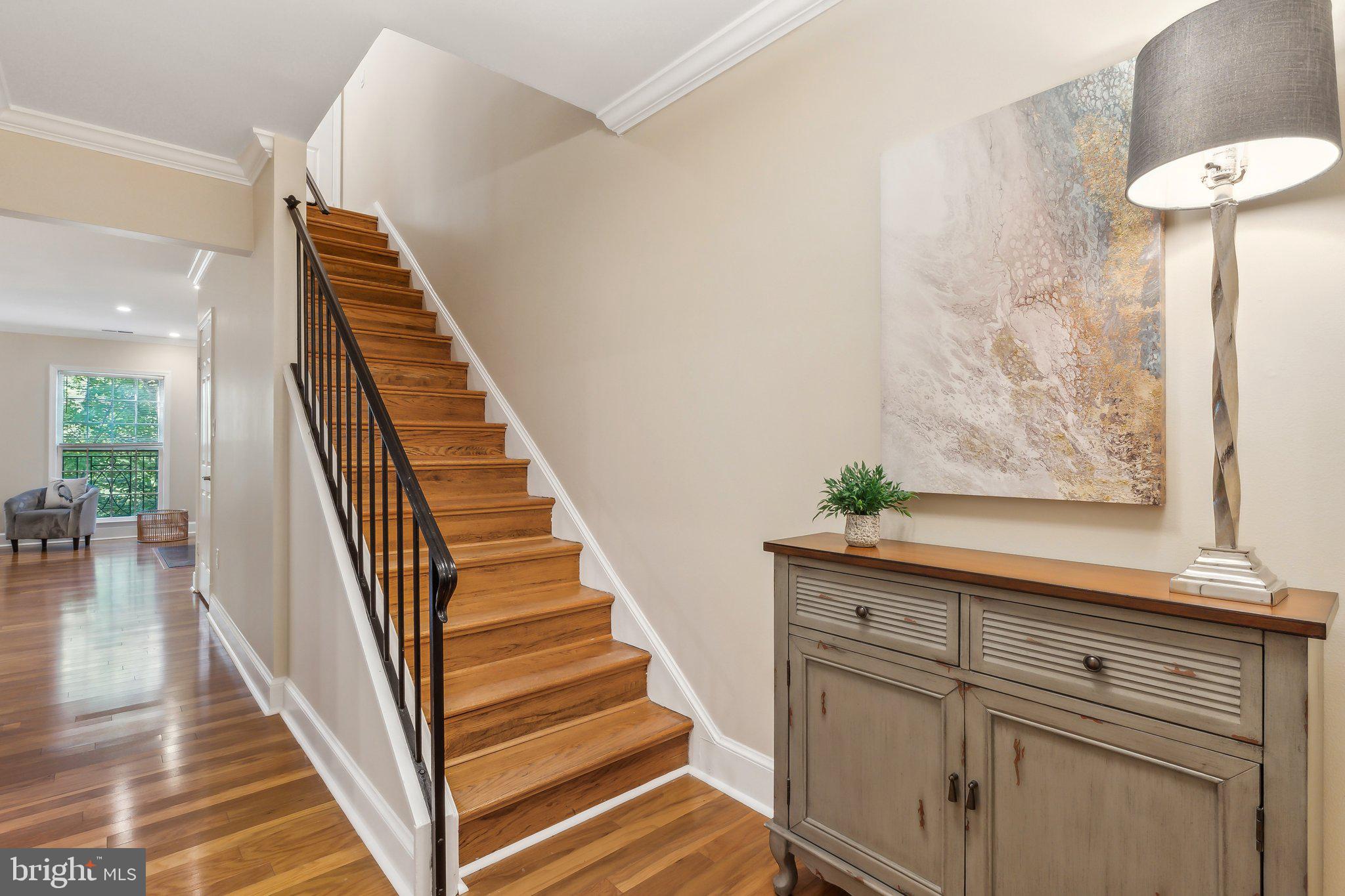 3205 Sutton Place Northwest, Unit A Washington, DC 20016 - Photo 17 of 44 a view of entryway and hall with wooden floor