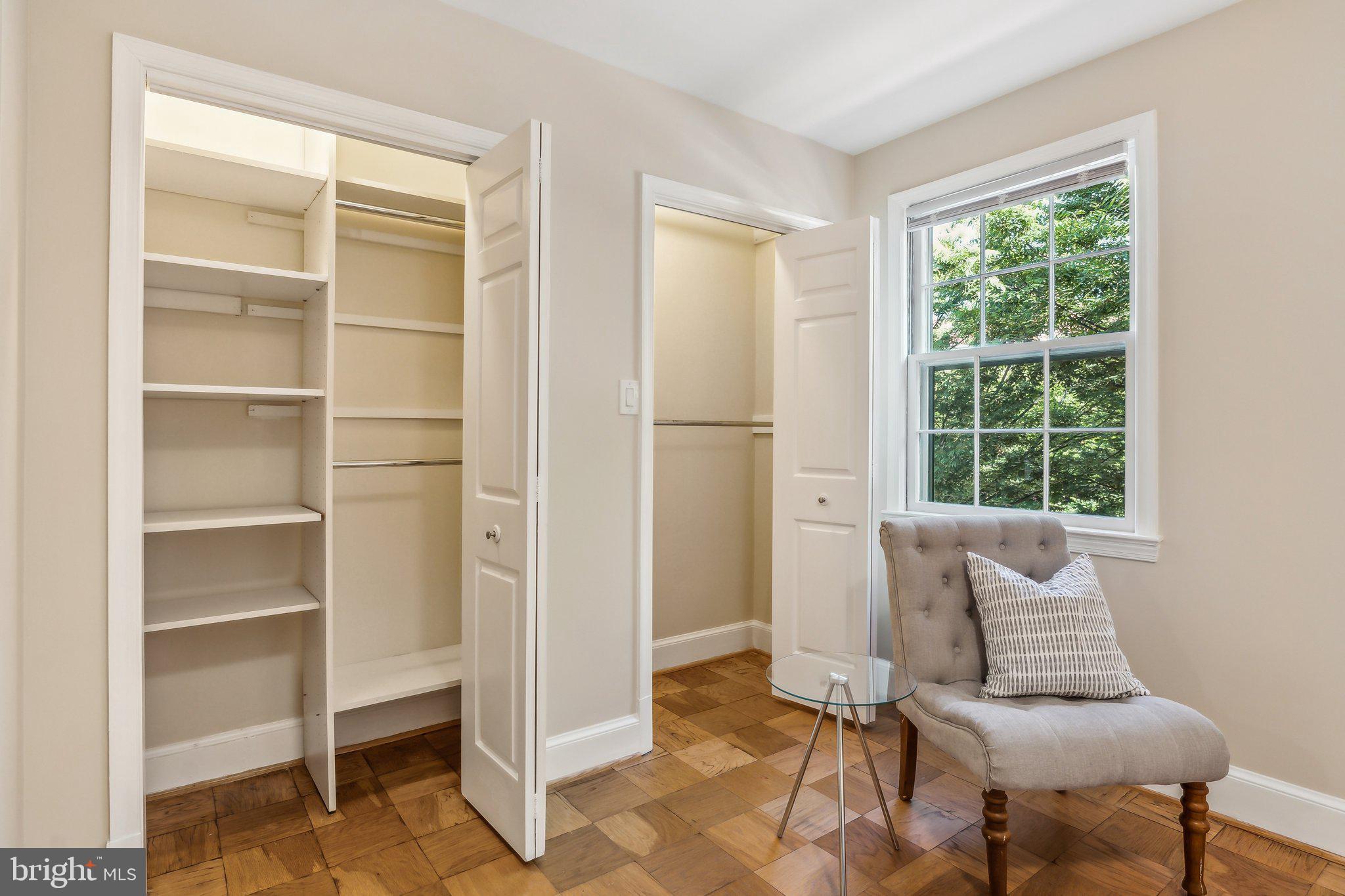 3205 Sutton Place Northwest, Unit A Washington, DC 20016 - Photo 23 of 44 a view of a livingroom with furniture and a window