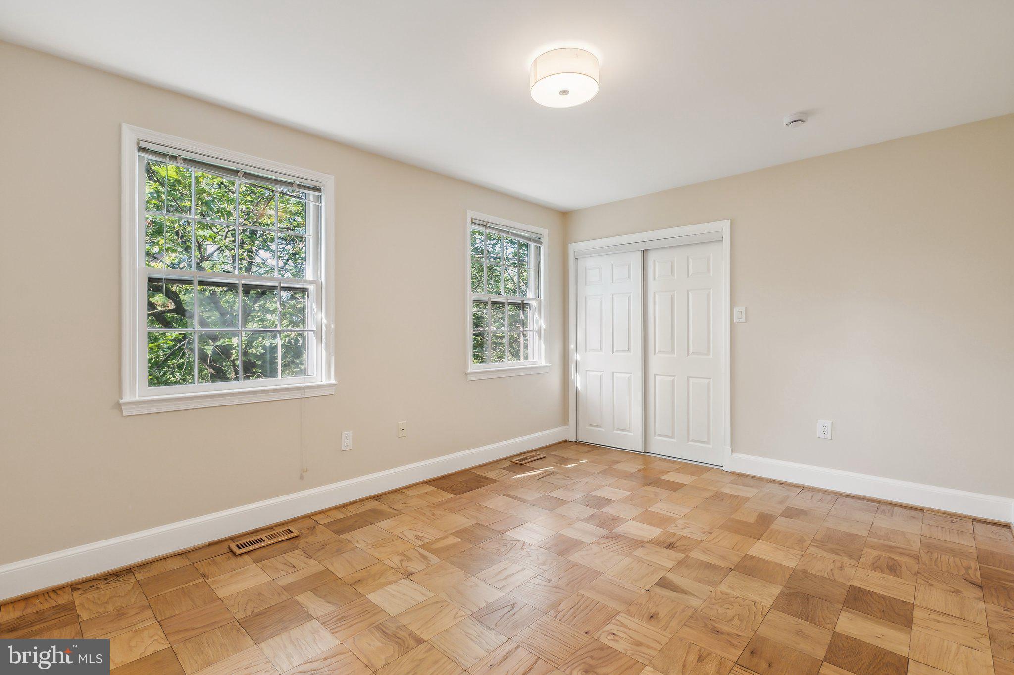 3205 Sutton Place Northwest, Unit A Washington, DC 20016 - Photo 26 of 44 a view of an empty room with a window