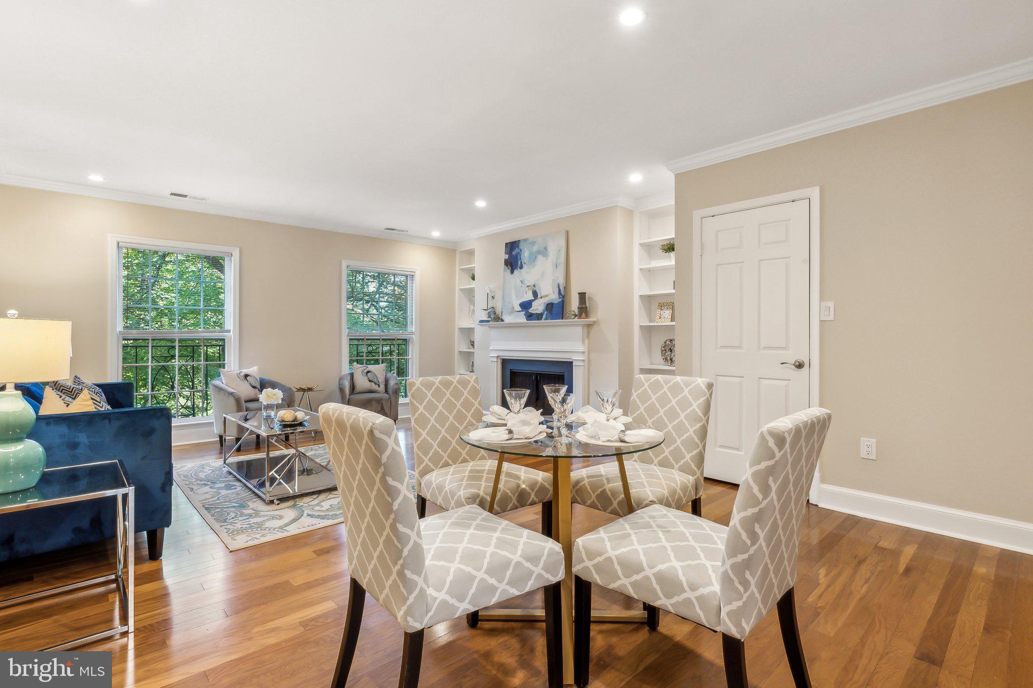 3205 Sutton Place Northwest, Unit A Washington, DC 20016 - Photo 9 of 44 a dining room with furniture window and wooden floor