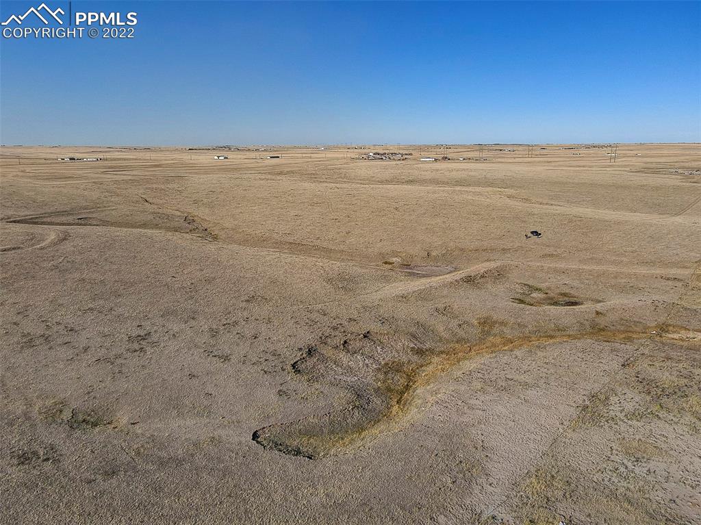 1300000083 Big Springs Road Yoder, CO 80864 - Photo 1 of 38 a view of an ocean beach