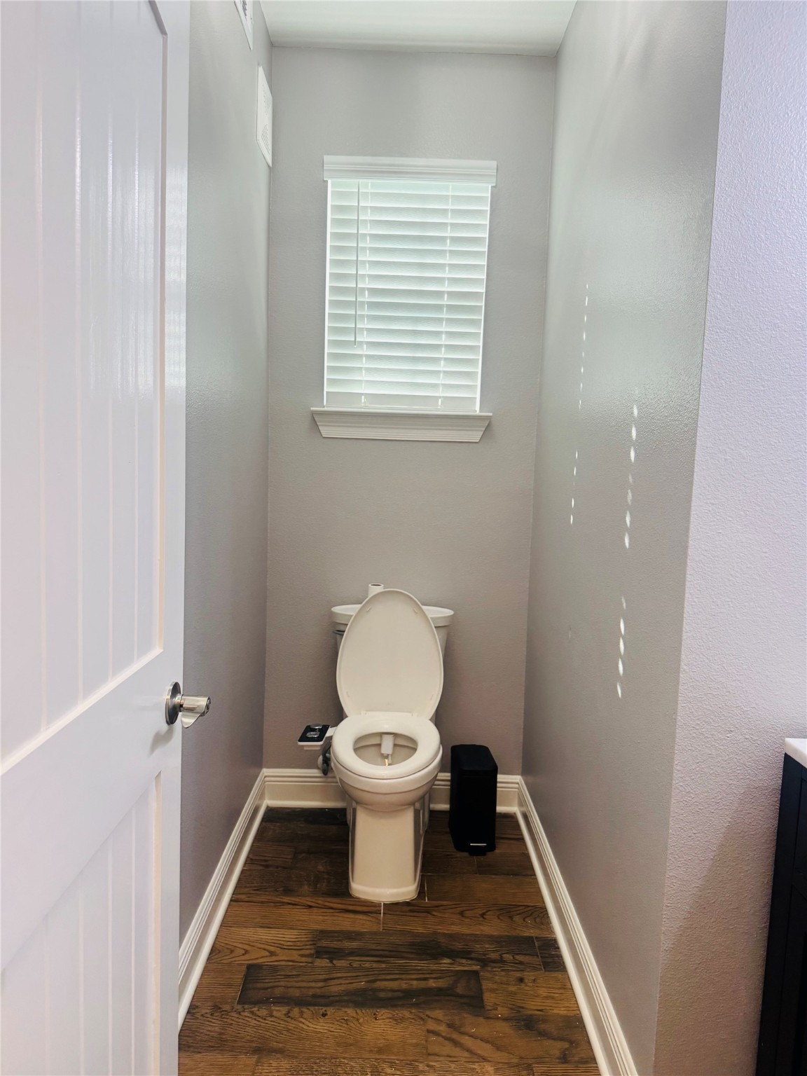 5317 Higgins Street Houston, TX 77033 - Photo 24 of 50 a bathroom with a toilet and a sink