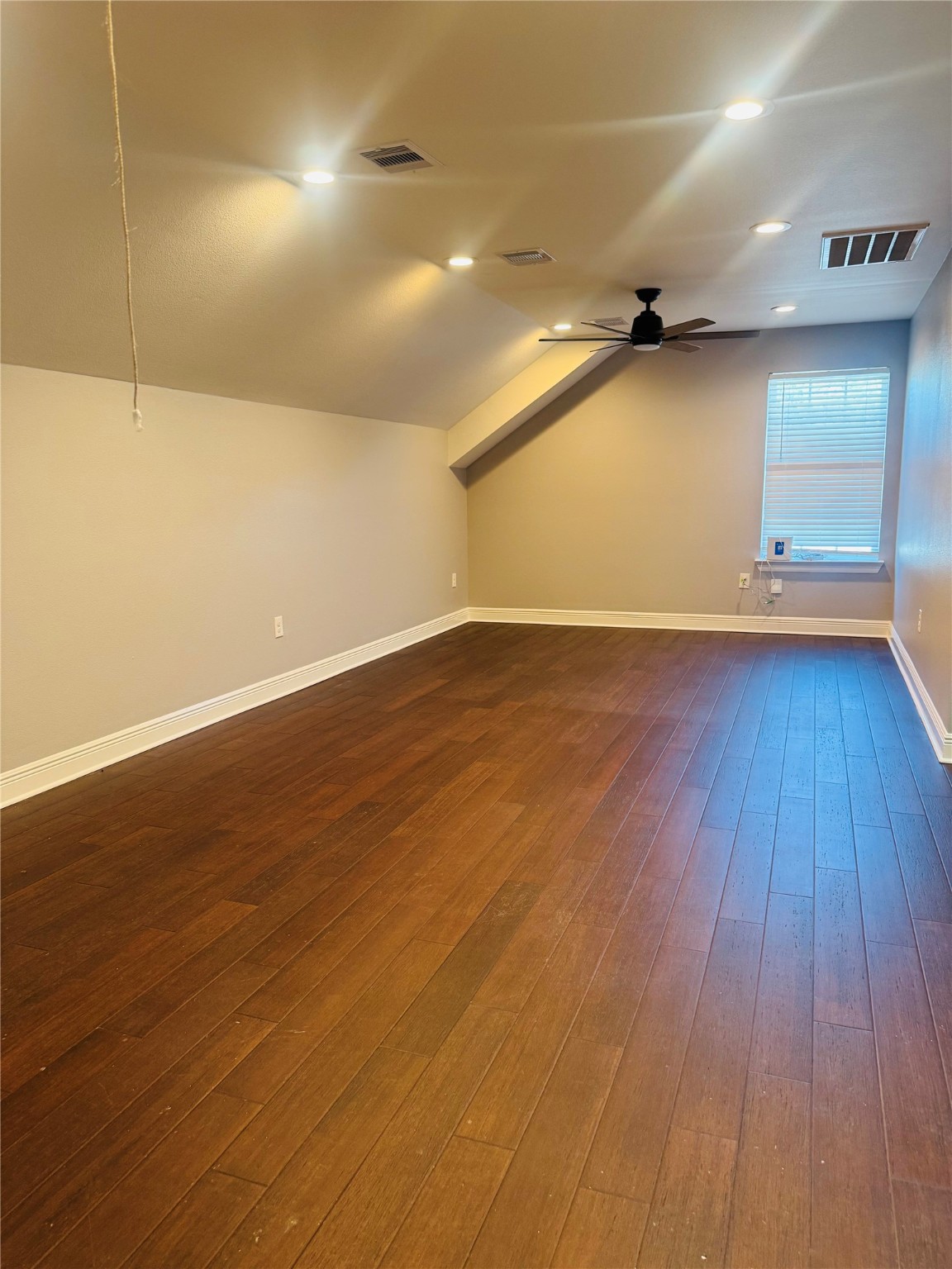 5317 Higgins Street Houston, TX 77033 - Photo 29 of 50 an empty room with wooden floor