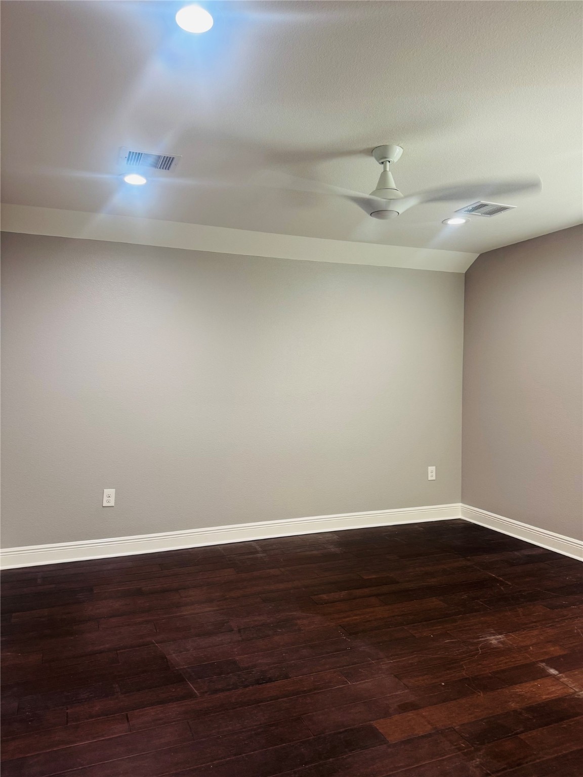 5317 Higgins Street Houston, TX 77033 - Photo 33 of 50 a view of an empty room with wooden floor