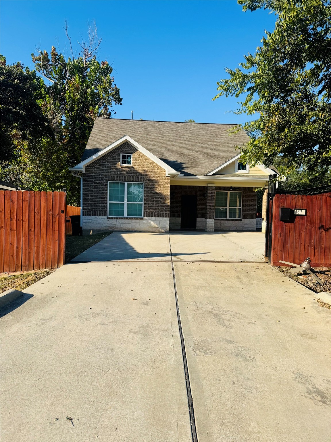 5317 Higgins Street Houston, TX 77033 - Photo 38 of 50 a front view of a house with a yard