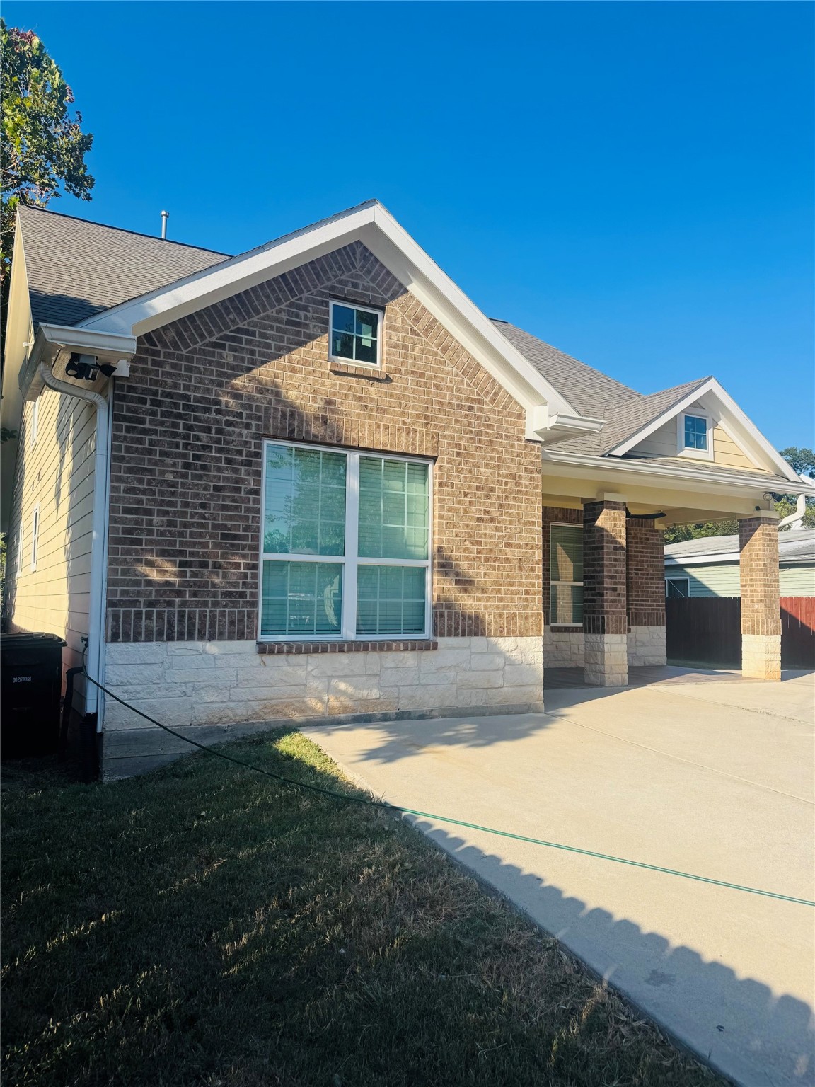 5317 Higgins Street Houston, TX 77033 - Photo 39 of 50 a front view of a house with a yard and garage