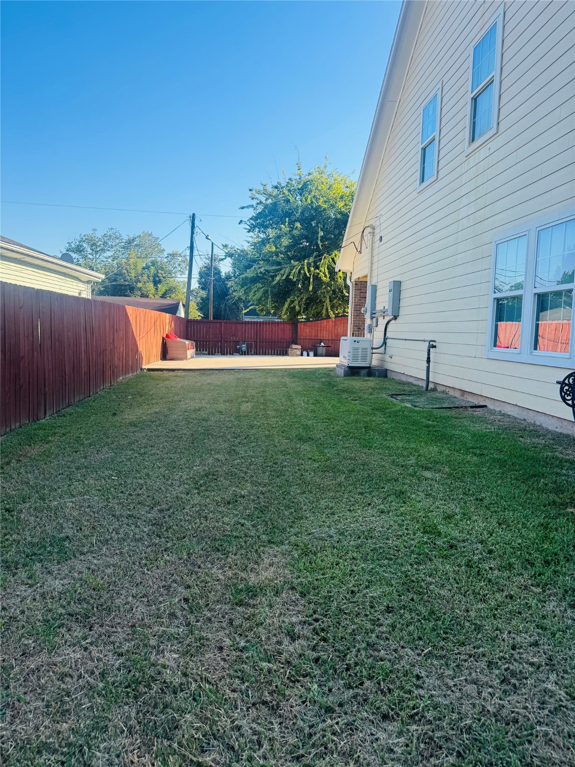 5317 Higgins Street Houston, TX 77033 - Photo 42 of 50 a view of backyard with house and outdoor seating