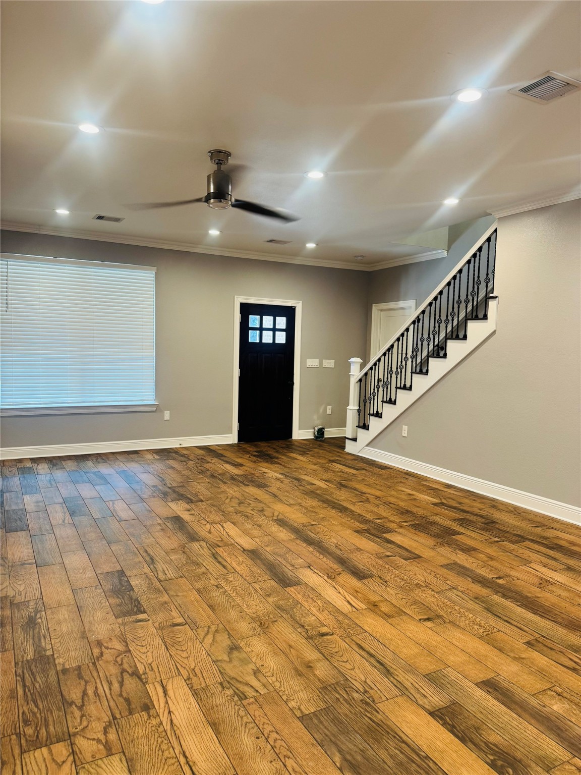 5317 Higgins Street Houston, TX 77033 - Photo 10 of 50 a view of an empty room with a chandelier