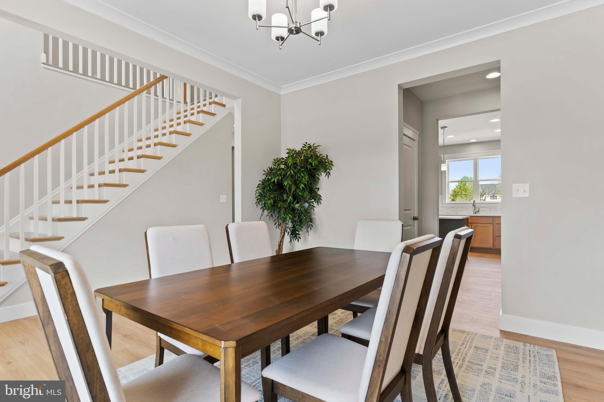 1010 Edorma Court Harrisburg, PA 17112 - Photo 14 of 38 a view of a dining room with furniture and wooden floor