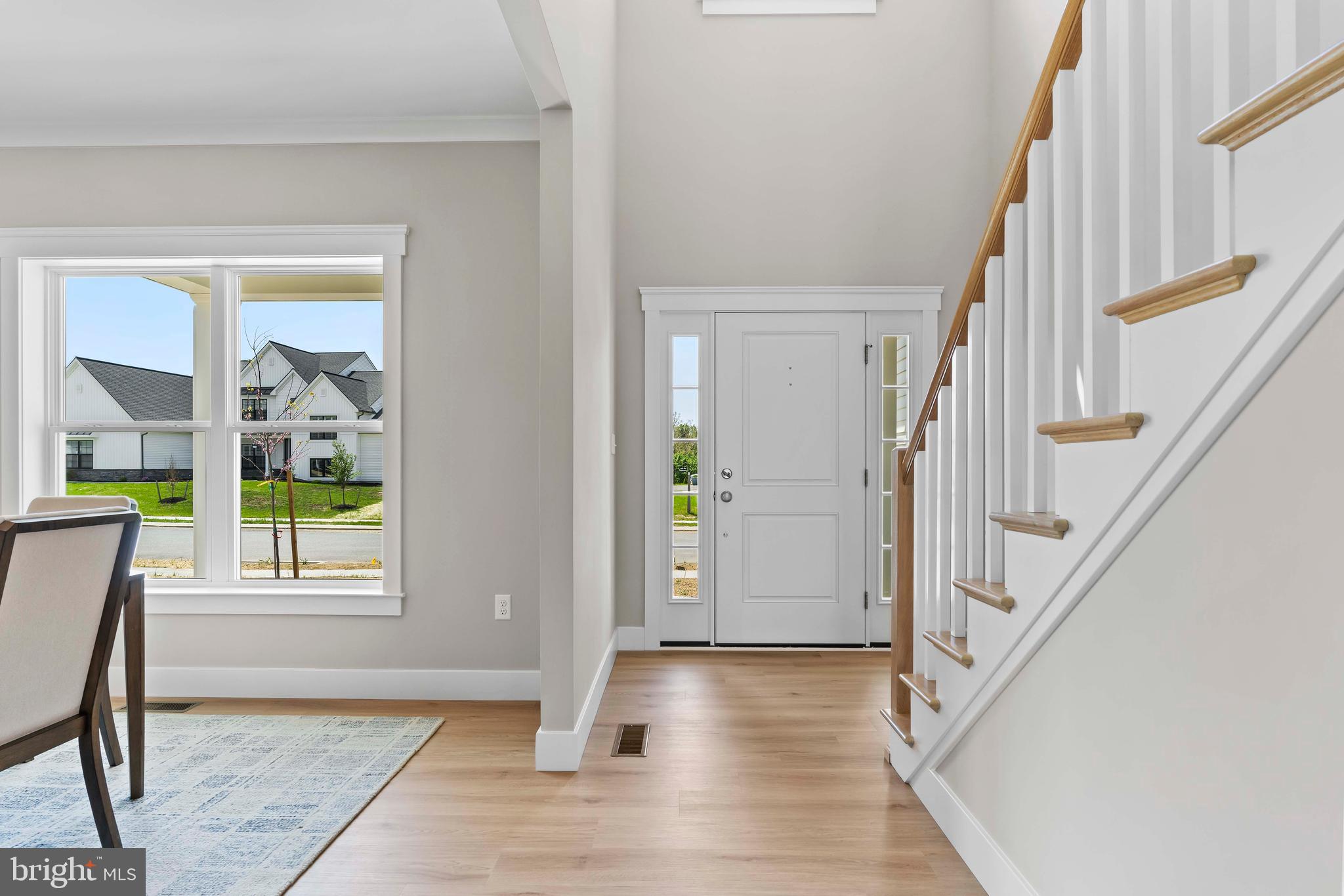 1010 Edorma Court Harrisburg, PA 17112 - Photo 19 of 38 a view of an entryway with wooden floor and door
