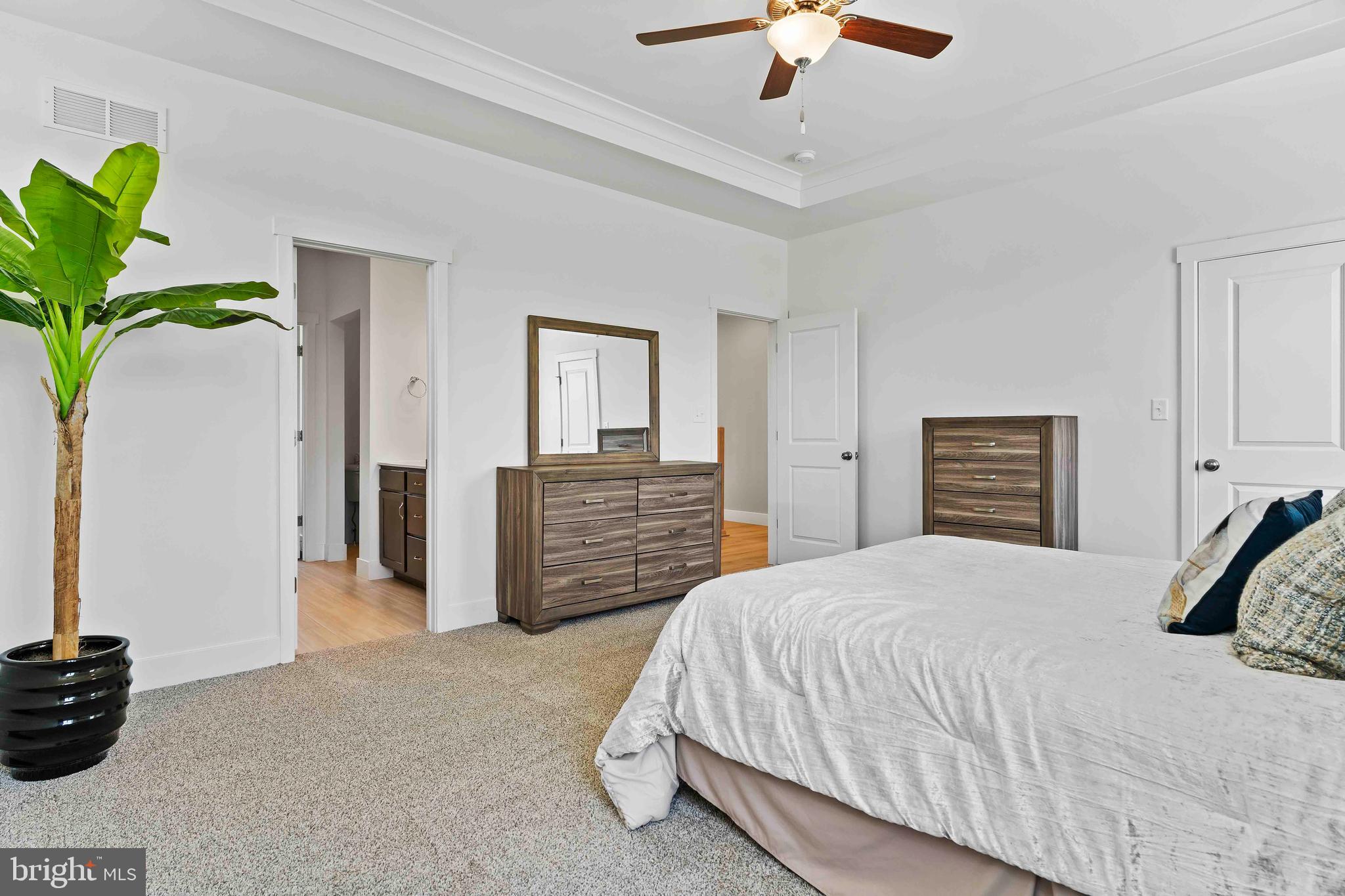 1010 Edorma Court Harrisburg, PA 17112 - Photo 25 of 38 a bedroom with a bed and ceiling fan