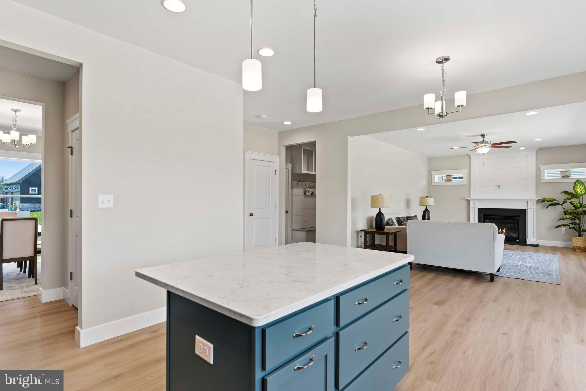 1010 Edorma Court Harrisburg, PA 17112 - Photo 7 of 38 an open kitchen with a table and chandelier