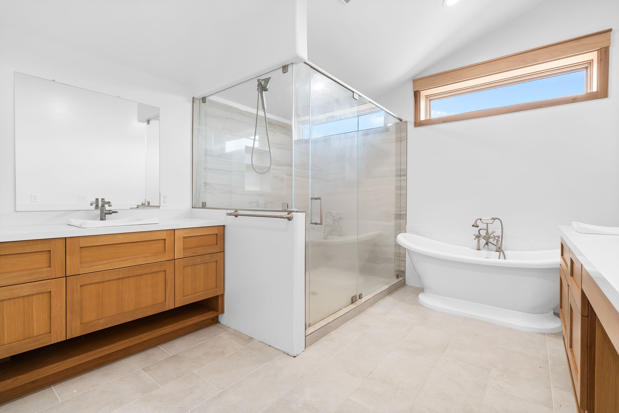1925 Hills Road Carmine, TX 78932 - Photo 25 of 49 a bathroom with a double vanity sink toilet mirror and bathtub