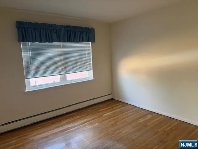 a bathroom with a toilet a sink and a shower