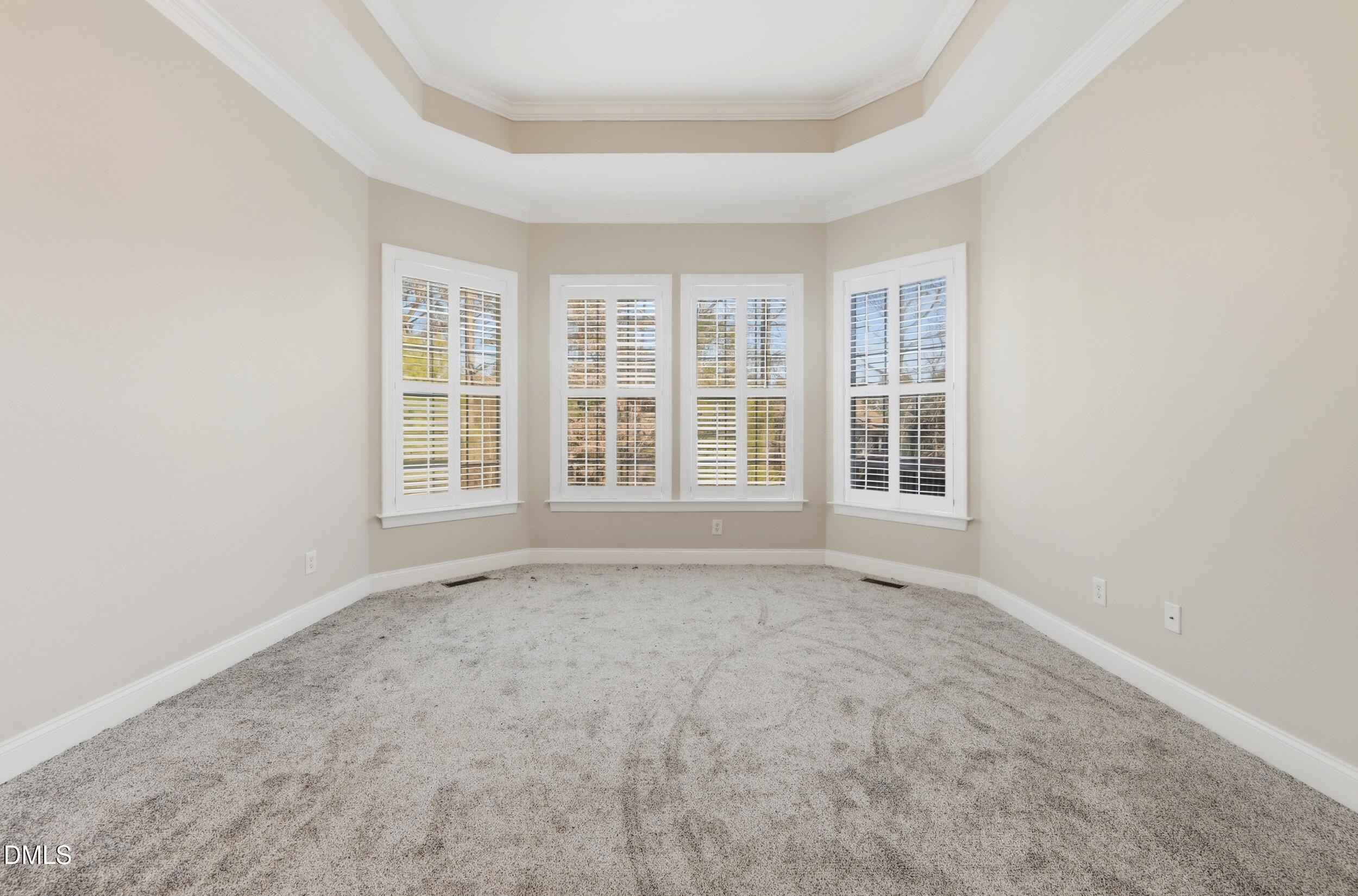 4803 Marena Place Durham, NC 27707 - Photo 13 of 42 an empty room with windows