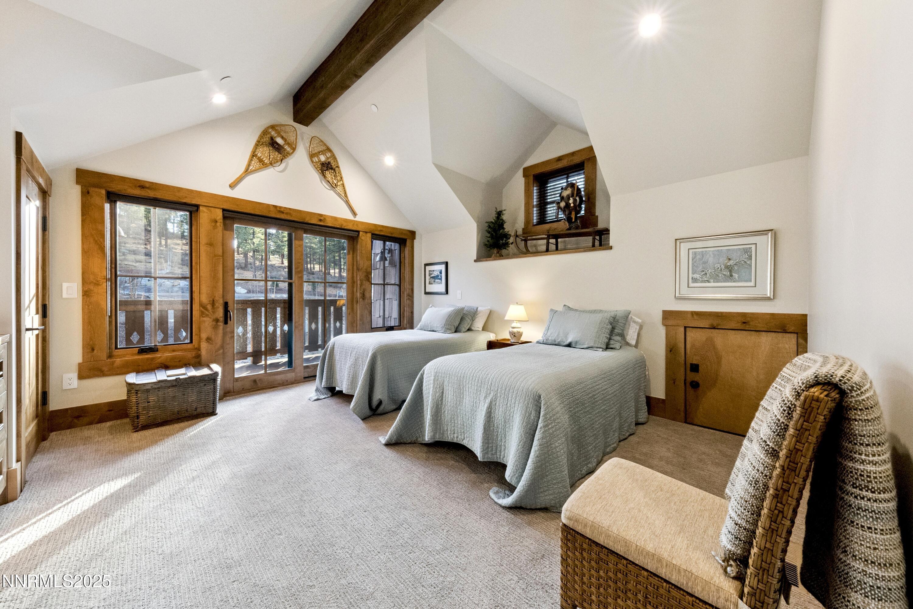 261 Redding Way Carson City, NV 89705 - Photo 45 of 90 a spacious bedroom with two beds and glass window