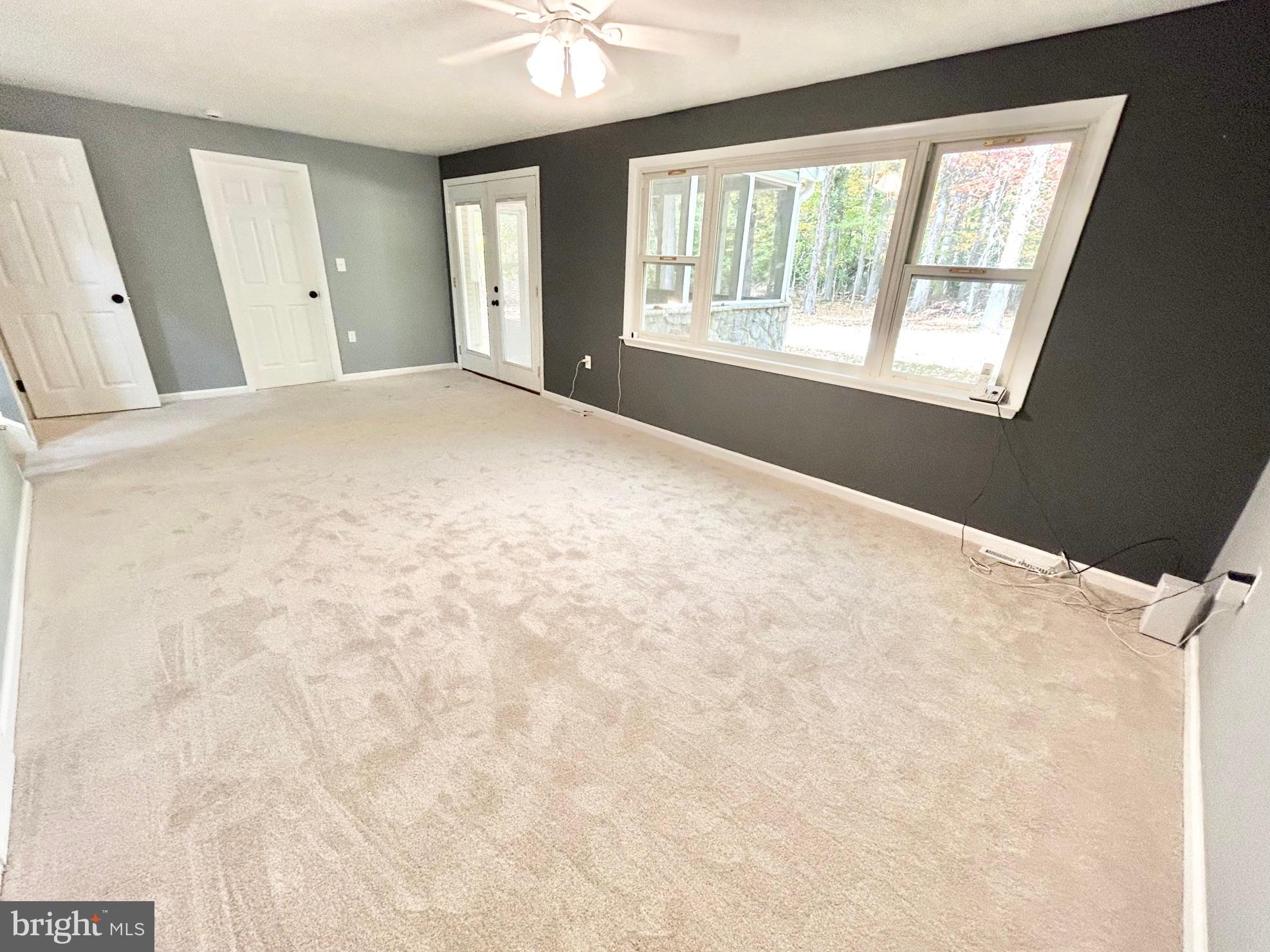 1224 Grinnell Road Wilmington, DE 19803 - Photo 10 of 48 a view of an empty room with a window