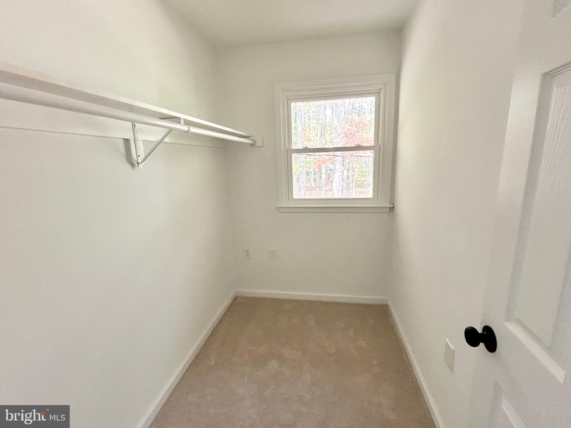 1224 Grinnell Road Wilmington, DE 19803 - Photo 22 of 48 a view of a room with rack on the wall