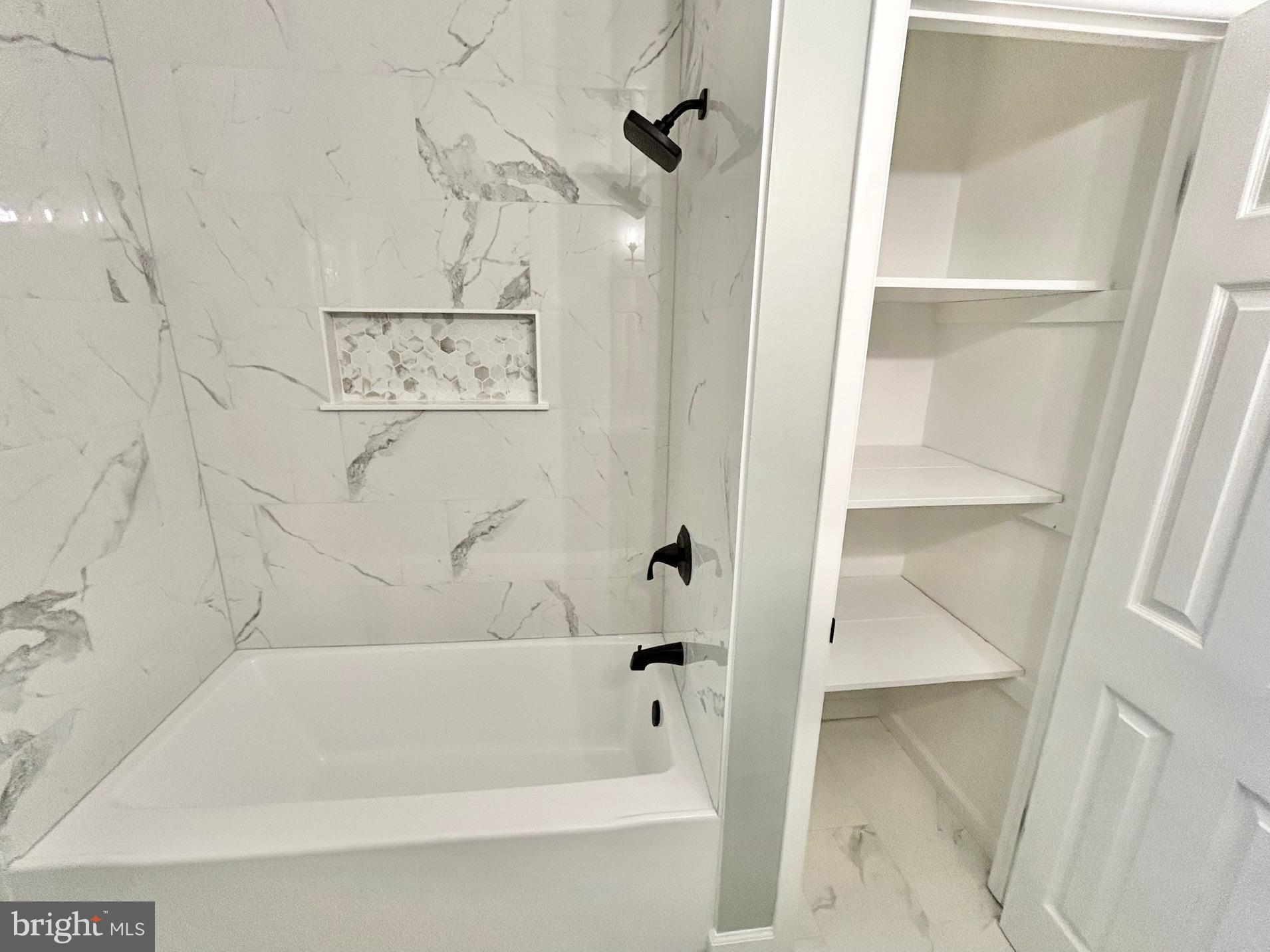 1224 Grinnell Road Wilmington, DE 19803 - Photo 26 of 48 a bathroom with a bathtub