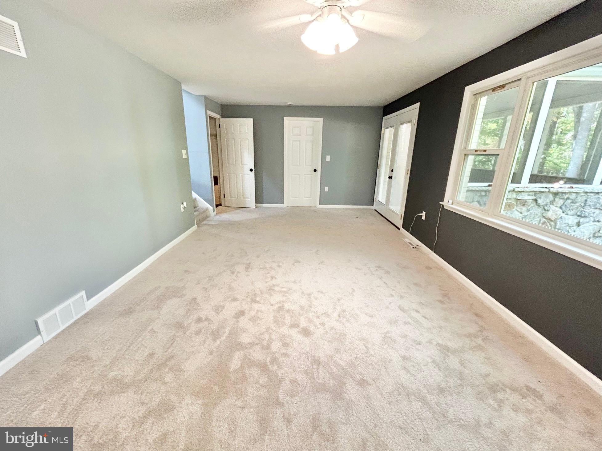 1224 Grinnell Road Wilmington, DE 19803 - Photo 9 of 48 a view of empty room with windows