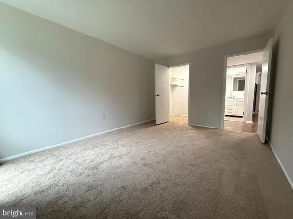 wooden floor and window in an empty room