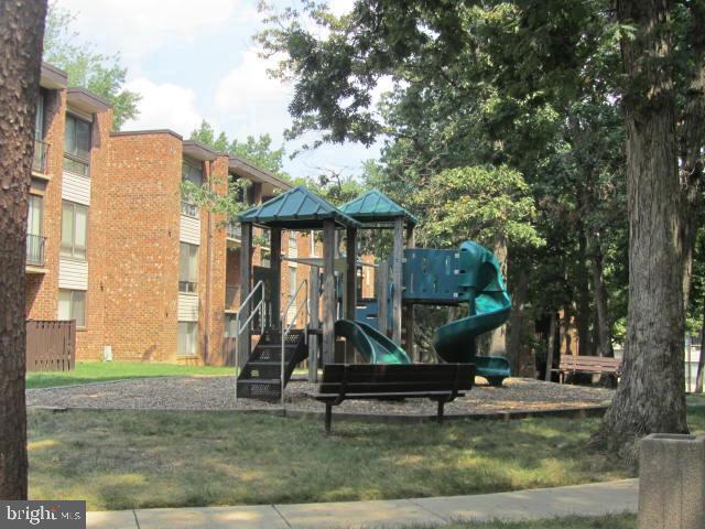8689 Greenbelt Road, Unit 101 Greenbelt, MD 20770 - Photo 26 of 27 a view of a park with large trees