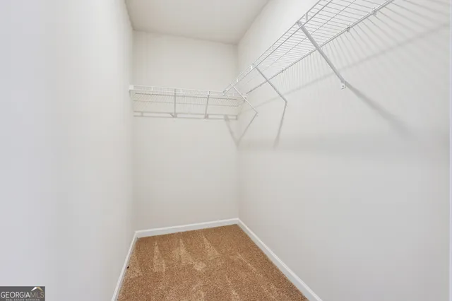 a view of a room with racks on the wall