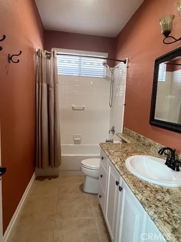 a view of cabinets and wooden floor