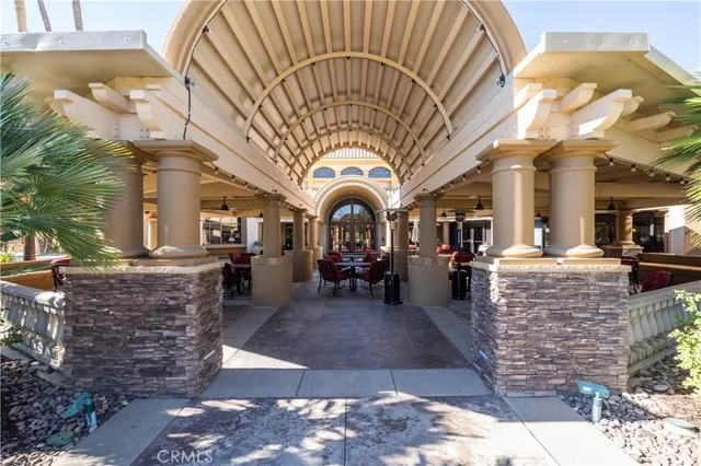 swimming pool view with outdoor seating