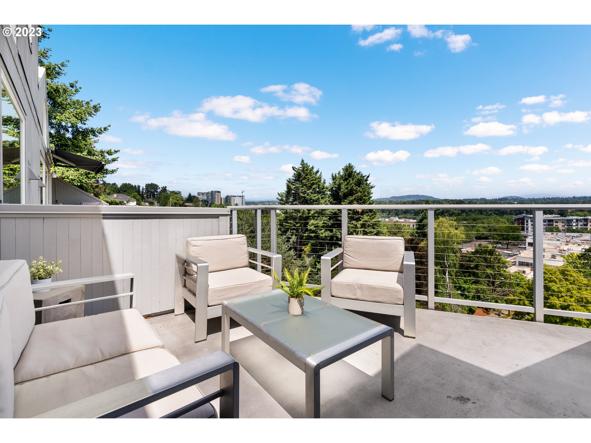 5411 Southwest View Point Terrace Portland, OR 97239 - Photo 20 of 44 a terrace view with seating space and garden view