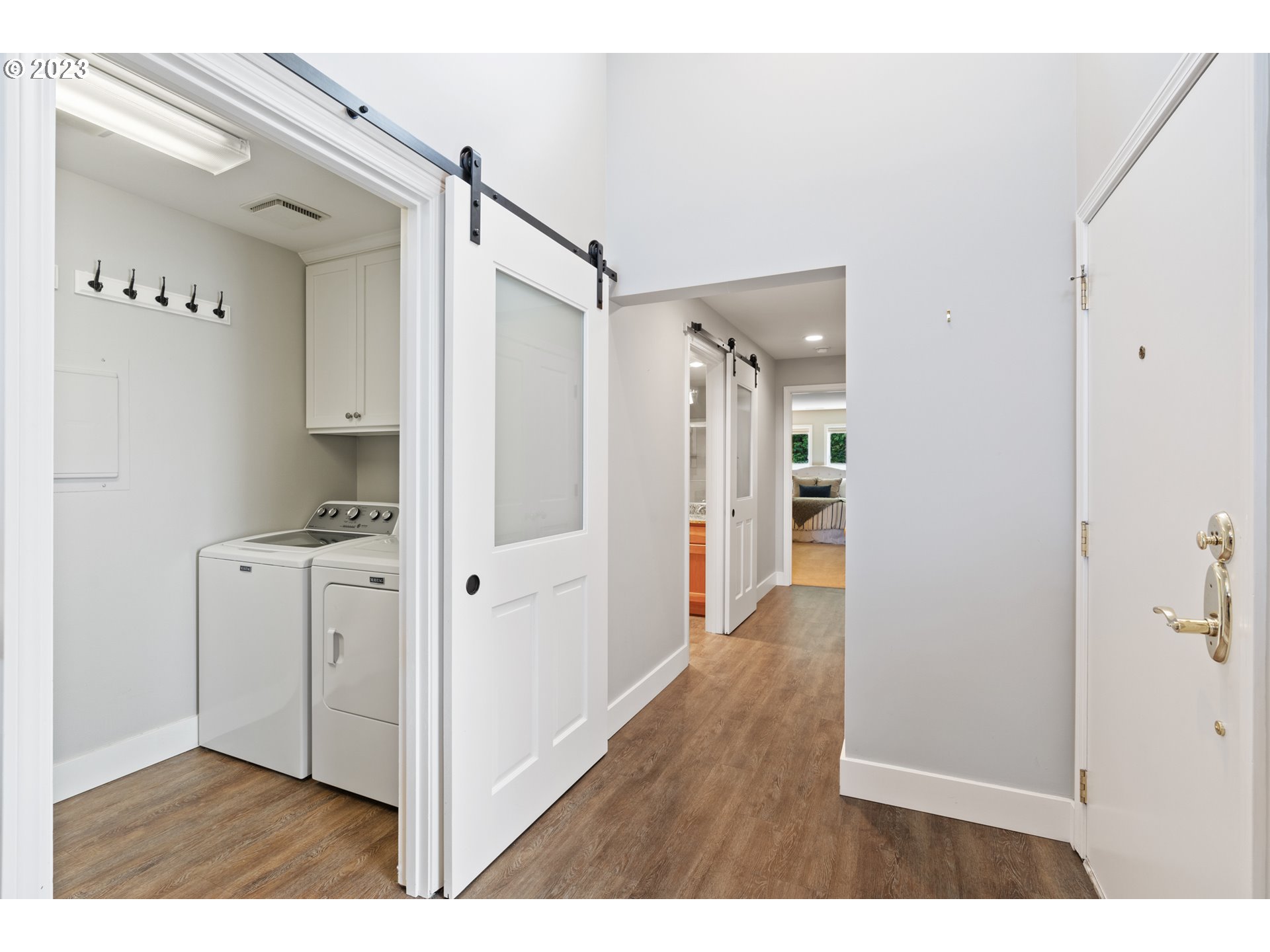 5411 Southwest View Point Terrace Portland, OR 97239 - Photo 23 of 44 a view of a walk in closet with wooden floor