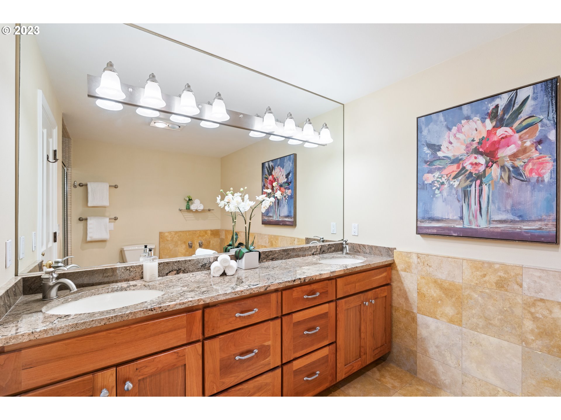 5411 Southwest View Point Terrace Portland, OR 97239 - Photo 33 of 44 a bathroom with a sink double vanity and a mirror
