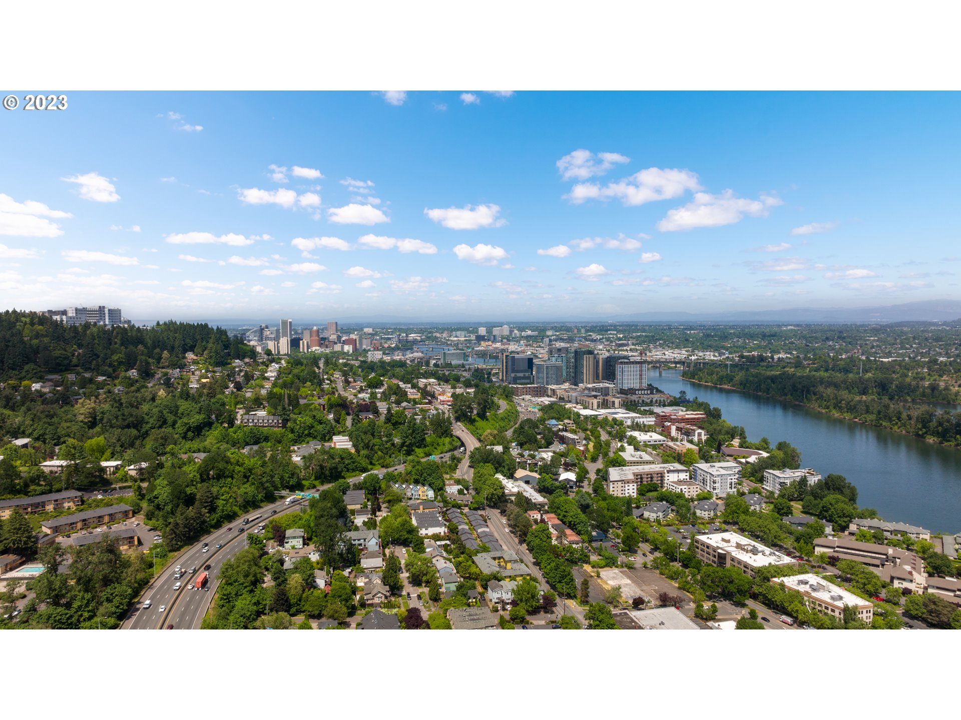 5411 Southwest View Point Terrace Portland, OR 97239 - Photo 43 of 44 a picture of city and a lake