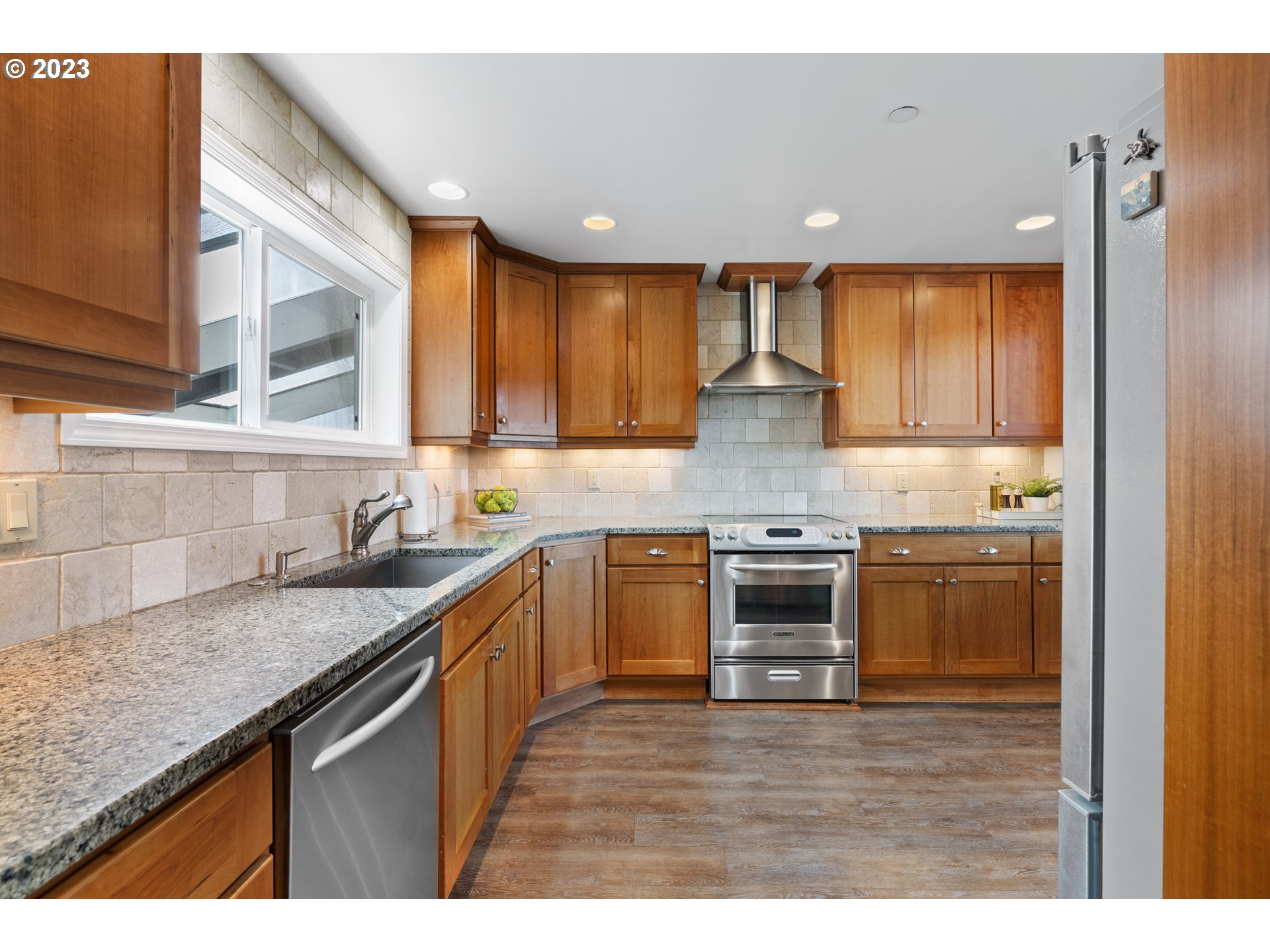 5411 Southwest View Point Terrace Portland, OR 97239 - Photo 7 of 44 a kitchen with a stove and a sink