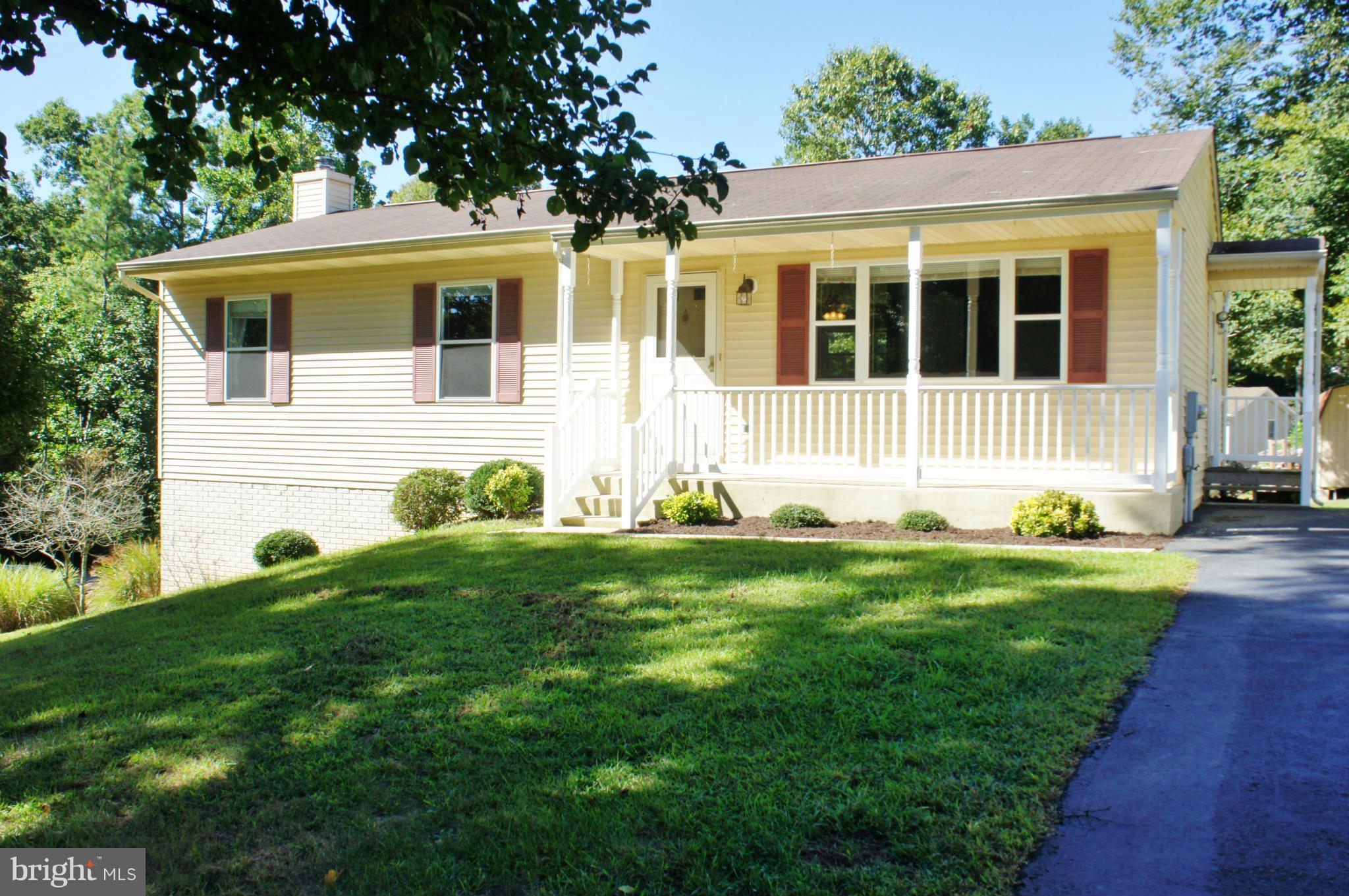 5015 Decatur Street St. Leonard, MD 20685 - Photo 22 of 30 a view of a house with a backyard