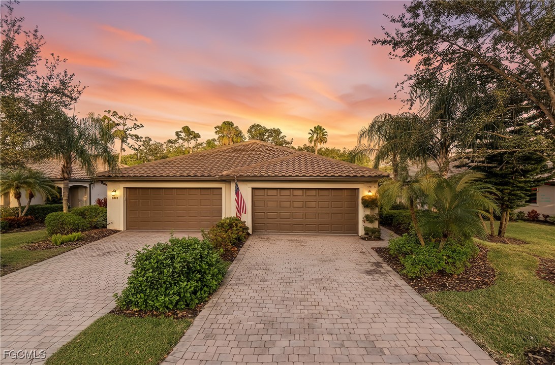 front view of a house with a yard