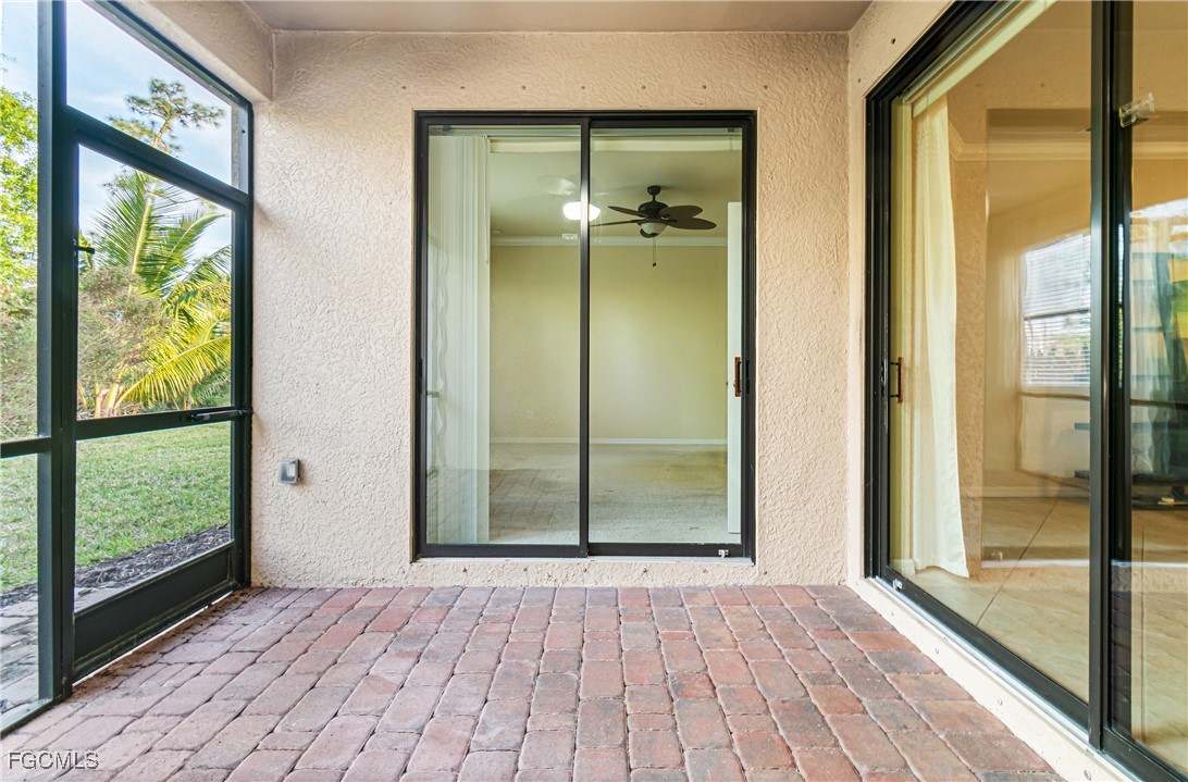 9101 Water Tupelo Road Fort Myers, FL 33912 - Photo 26 of 43 a view of a bathroom with a glass door and shower