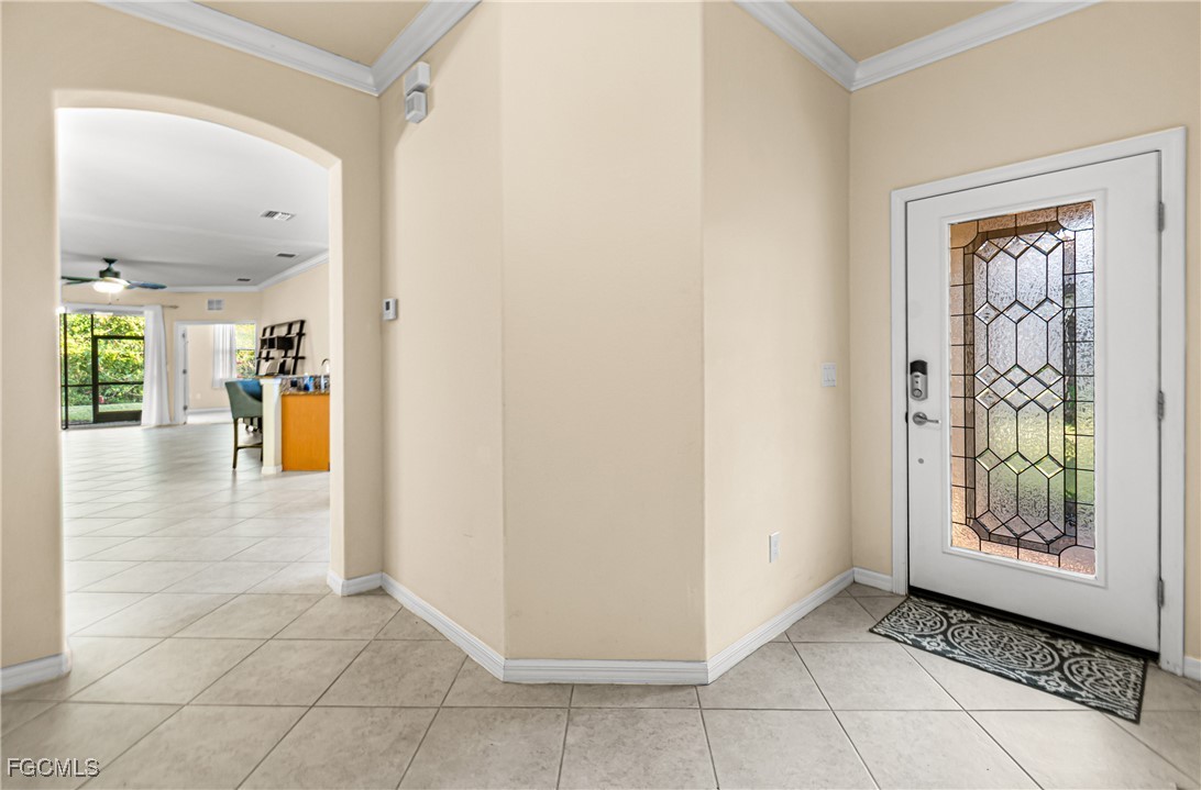 9101 Water Tupelo Road Fort Myers, FL 33912 - Photo 6 of 43 a view of a hallway view with wooden floor and windows