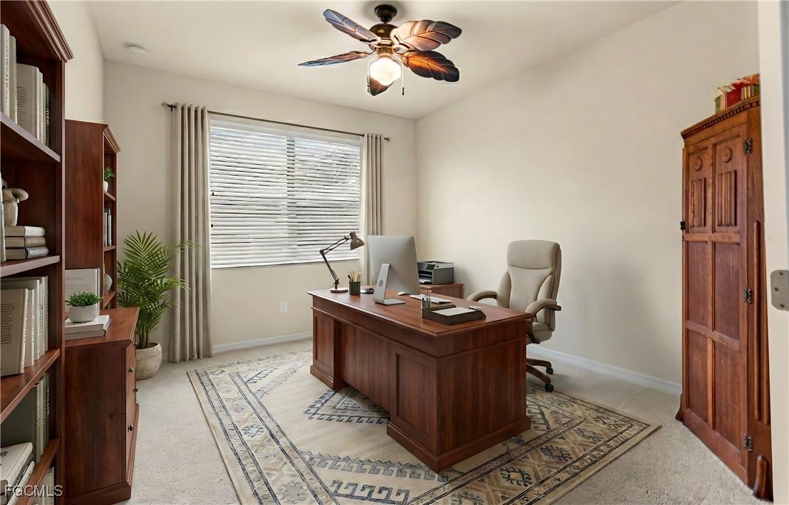 9101 Water Tupelo Road Fort Myers, FL 33912 - Photo 10 of 43 a view of a workspace with furniture and a window