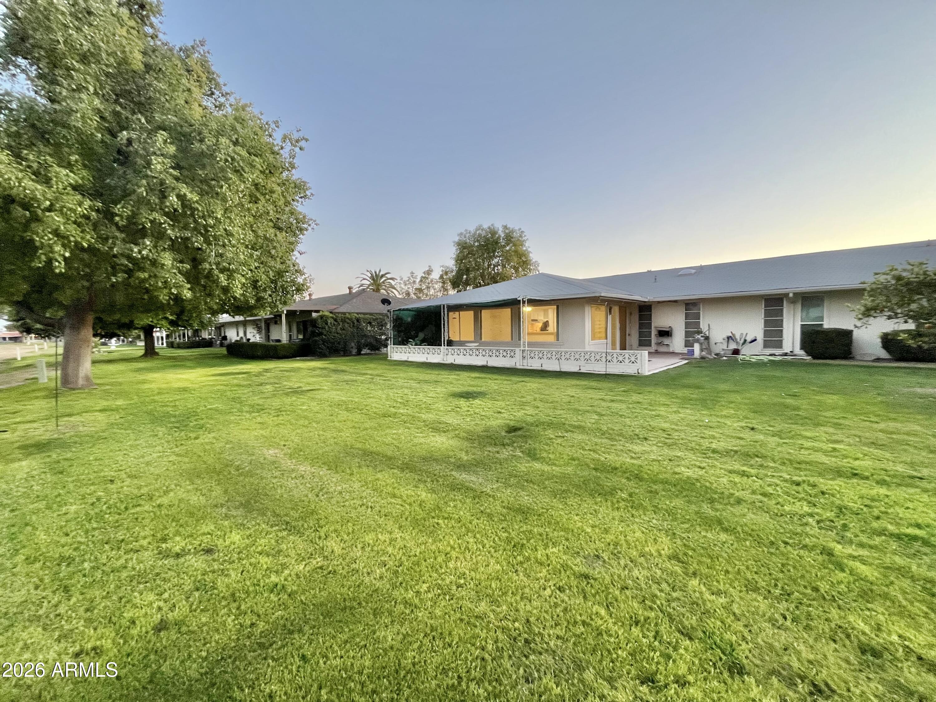 9718 West Oak Ridge Drive Sun City, AZ 85351 - Photo 23 of 41 a view of a house with a big yard