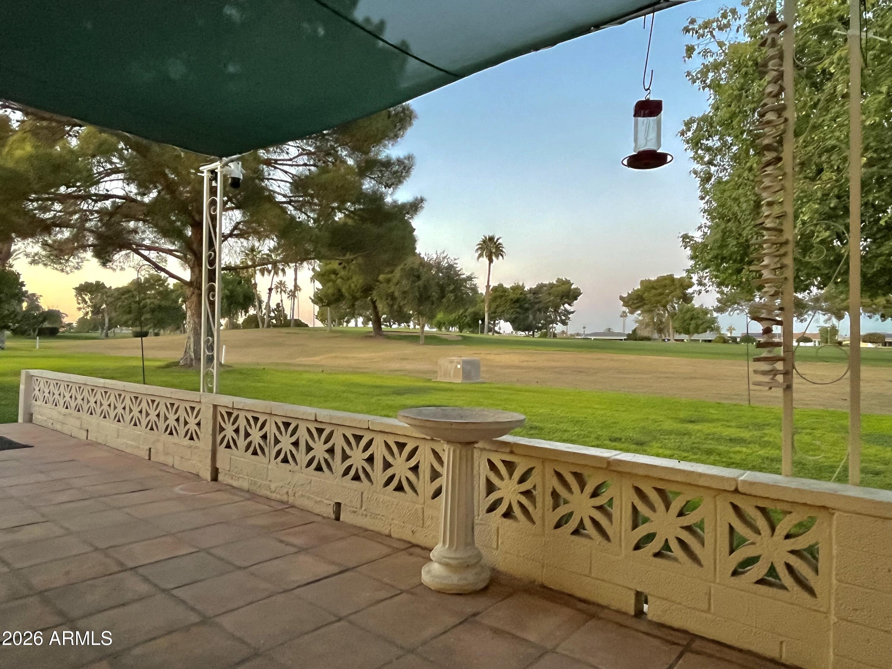 9718 West Oak Ridge Drive Sun City, AZ 85351 - Photo 27 of 41 a view of a garden with an outdoor space
