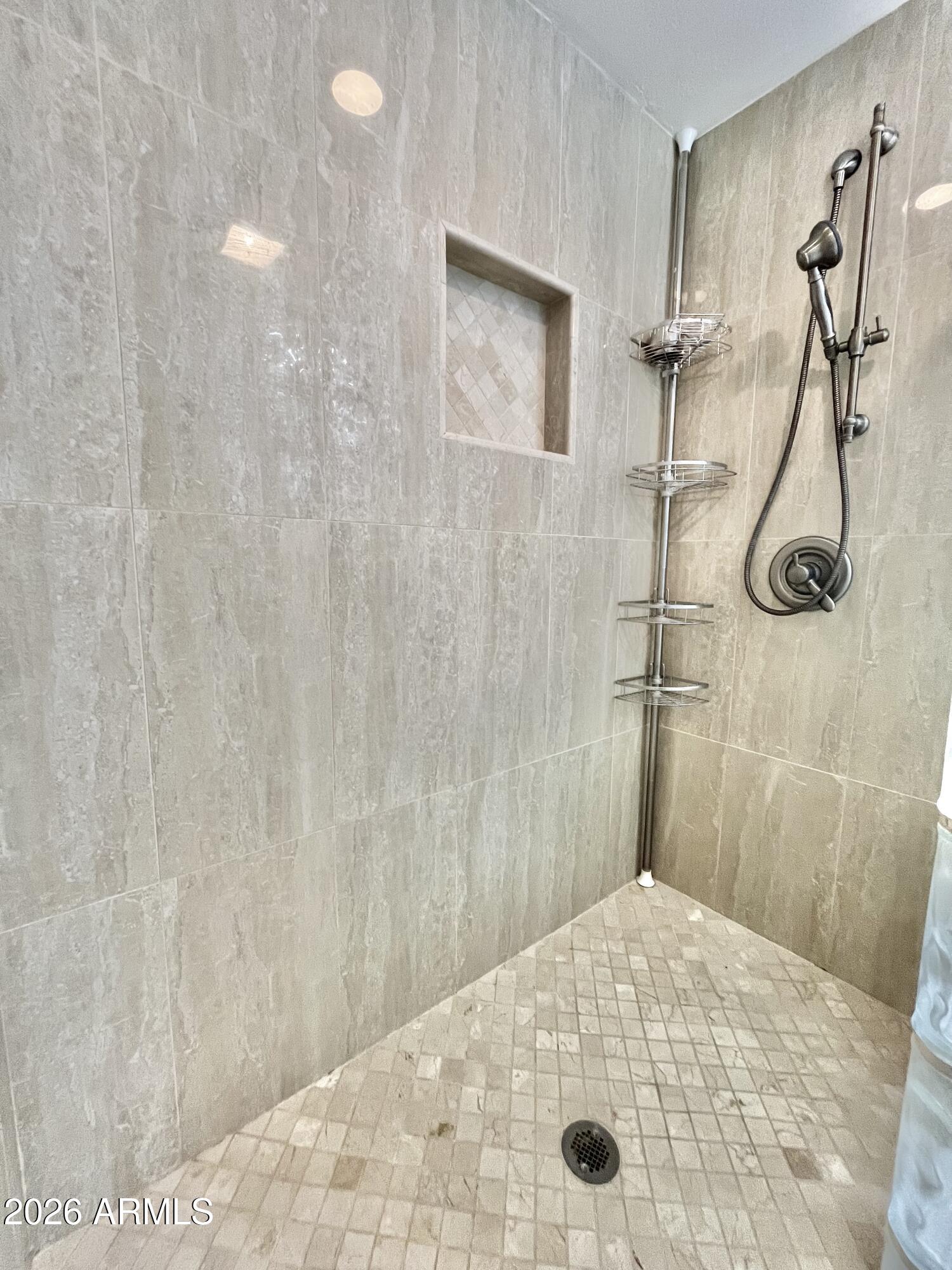 9718 West Oak Ridge Drive Sun City, AZ 85351 - Photo 6 of 41 a bathroom with a shower