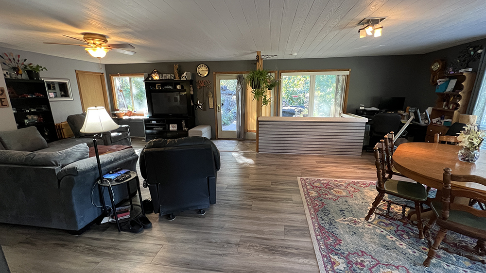 18510 Sand Road Fulton, IL 61252 - Photo 10 of 54 a view of a livingroom with furniture window and wooden floor
