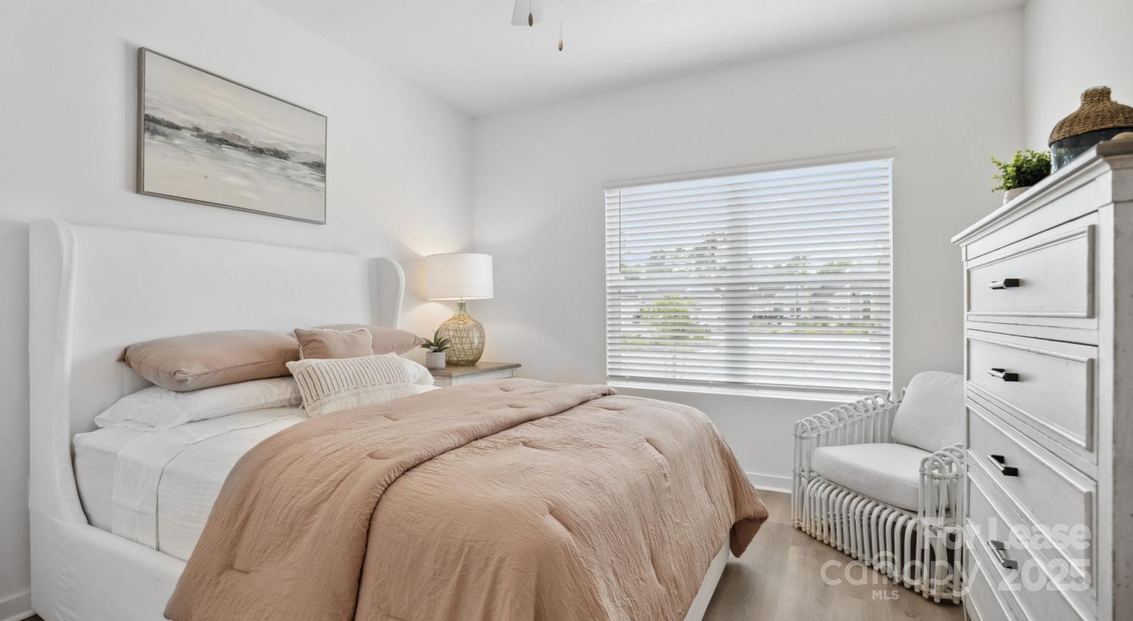 129 Blume Road, Unit MEANDER Mooresville, NC 28117 - Photo 14 of 32 a bedroom with a bed and a window